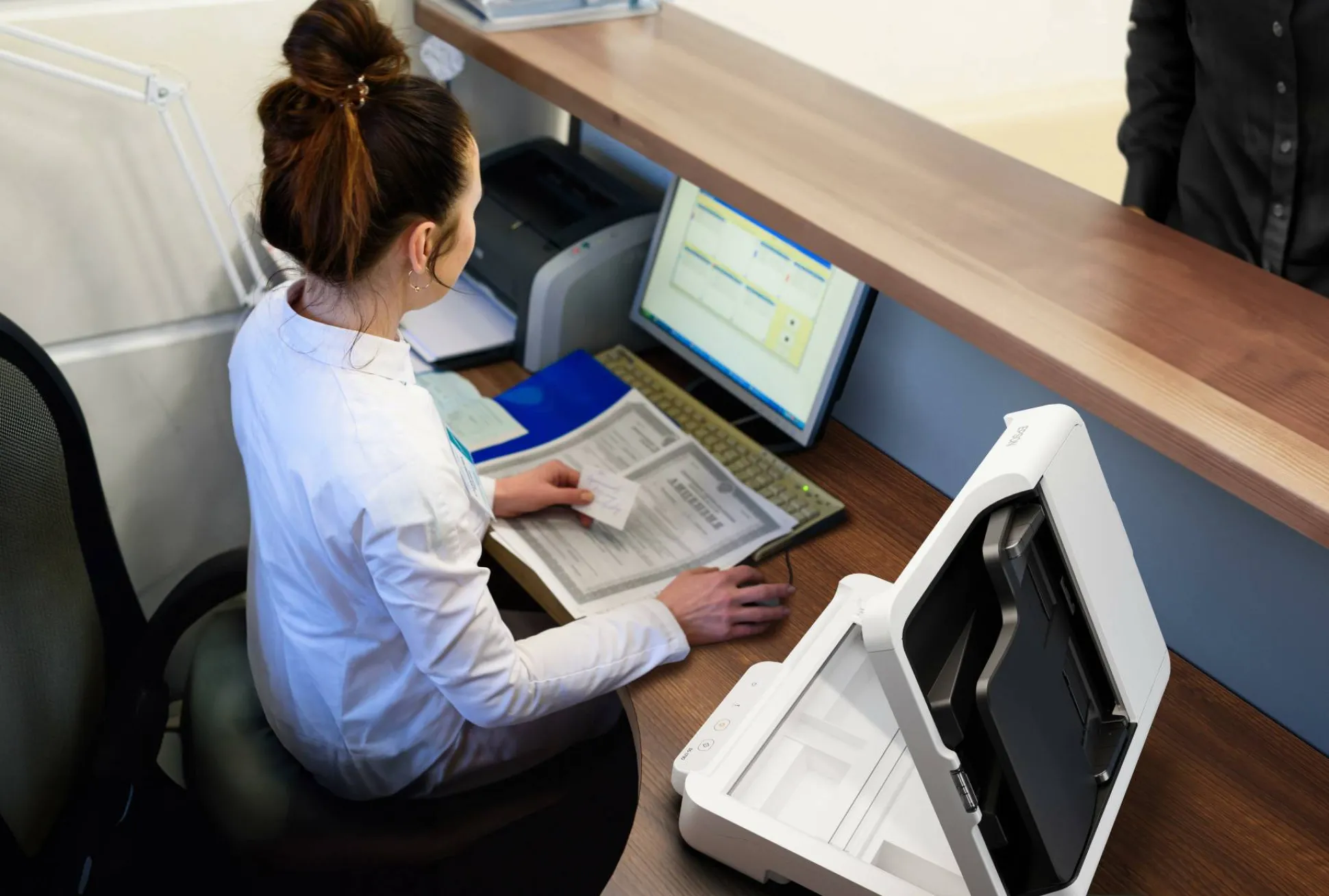 Scanner à plat compact WorkForce DS-1730 pour les petites entreprises et les bureaux à domicile.