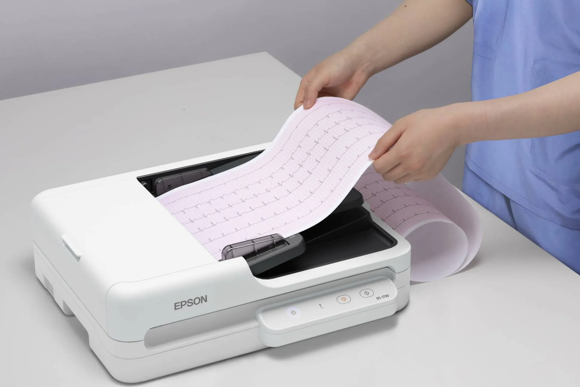 Scanner à plat compact WorkForce DS-1730 pour les petites entreprises et les bureaux à domicile.